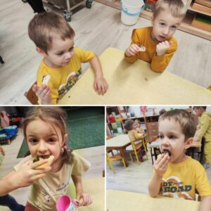 Grupa dzieci zajadająca bułeczki drożdżowe z cebulką.